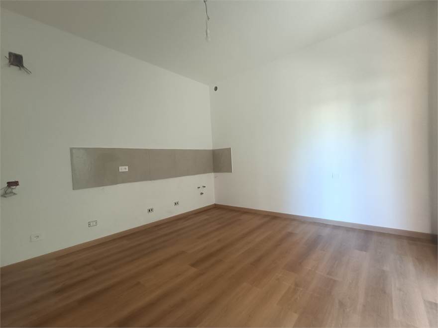 soggiorno con angolo cottura