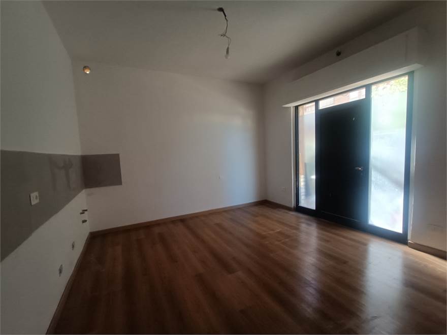 soggiorno con angolo cottura