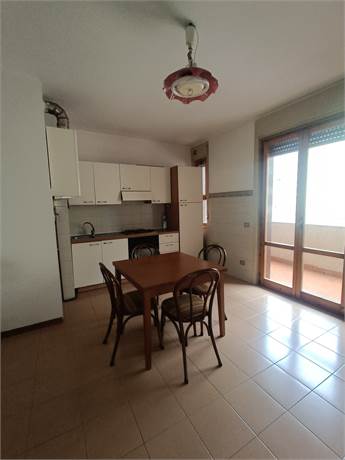 soggiorno con angolo cottura